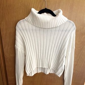 White cropped turtleneck sweater